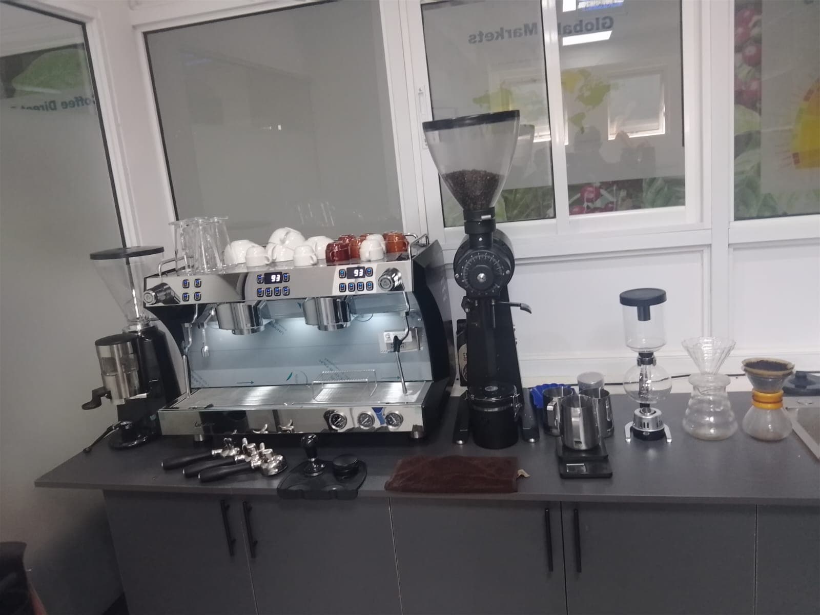 Close-up of the Antonov espresso machine and brewing equipment lineup