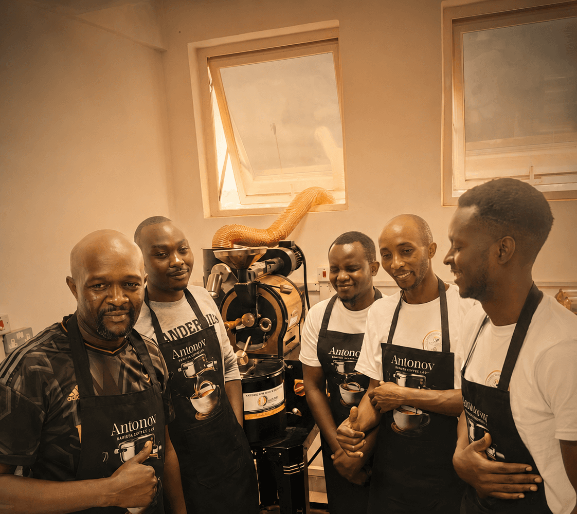Students learning coffee roasting and processing on a roaster